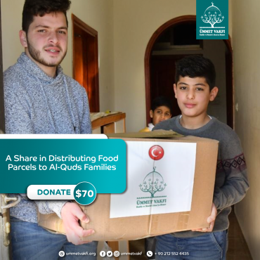 A Share in Distributing Food Parcels to Al-Quds Families